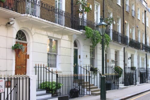 Elegant Georgian townhouses in central London representing popular areas where escort services are available